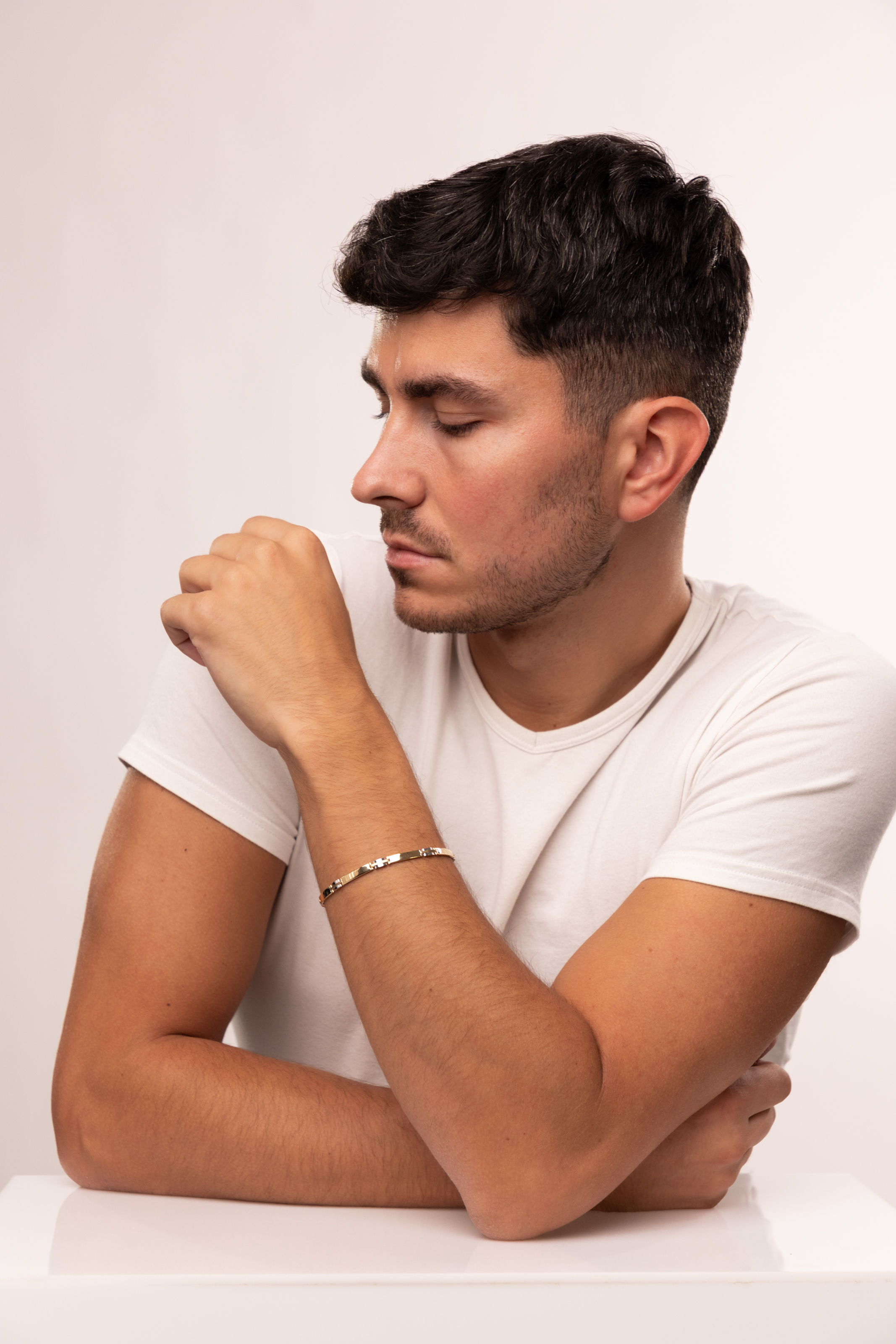 Złota męska bransoleta z rodowanymi elementami, długość 21 cm, próba 585