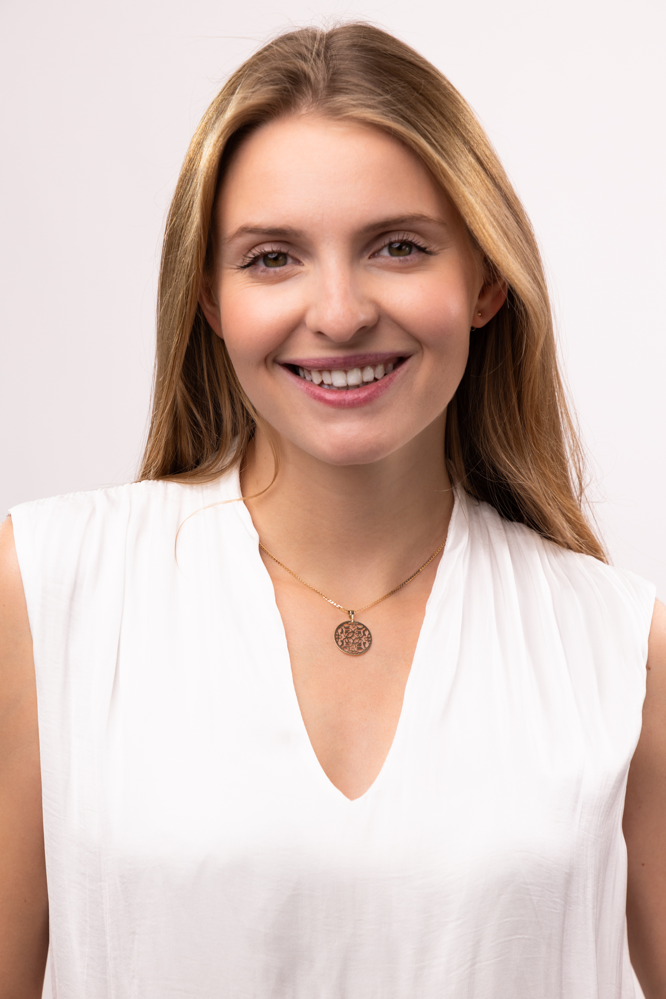 Okrągła złota zawieszka z ażurowym wzorem, próba 585