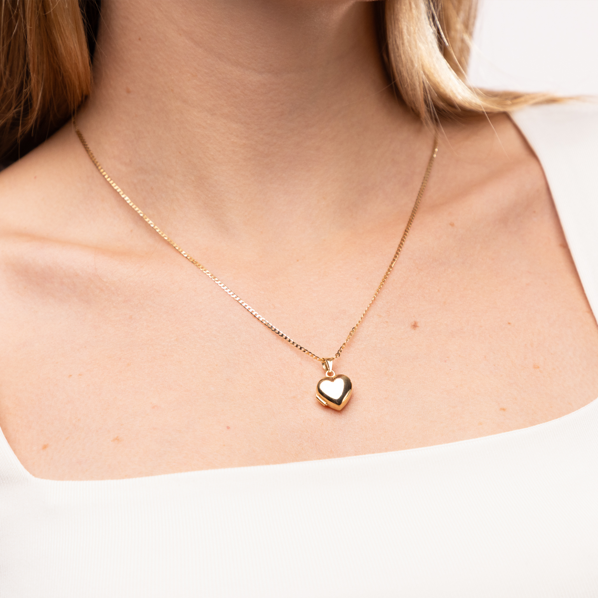 Złota zawieszka puzderko w kształcie gładkiego serca, próba 585