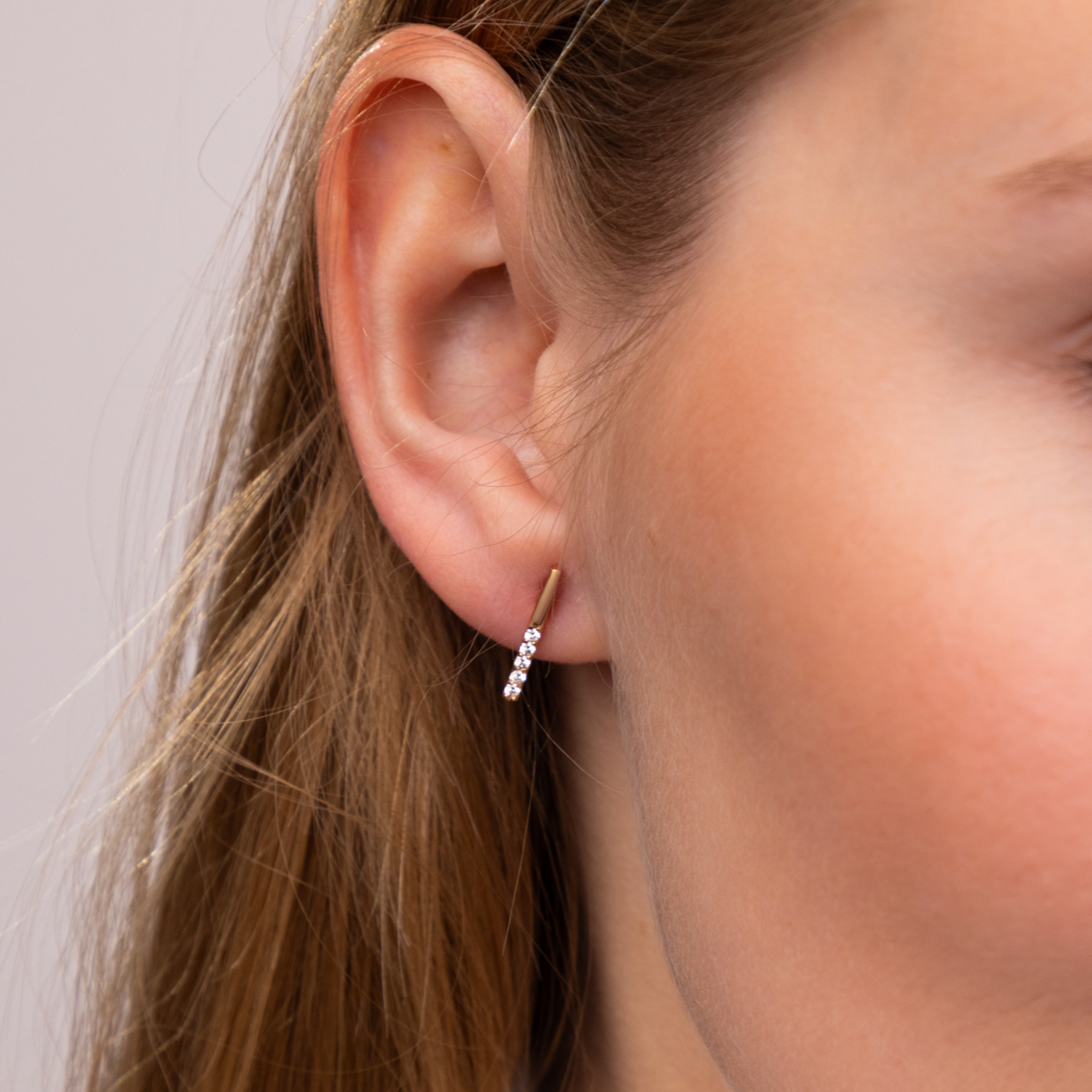 Kolczyki patyczki z cyrkoniami na sztyfcie z różowego złota, próba 585