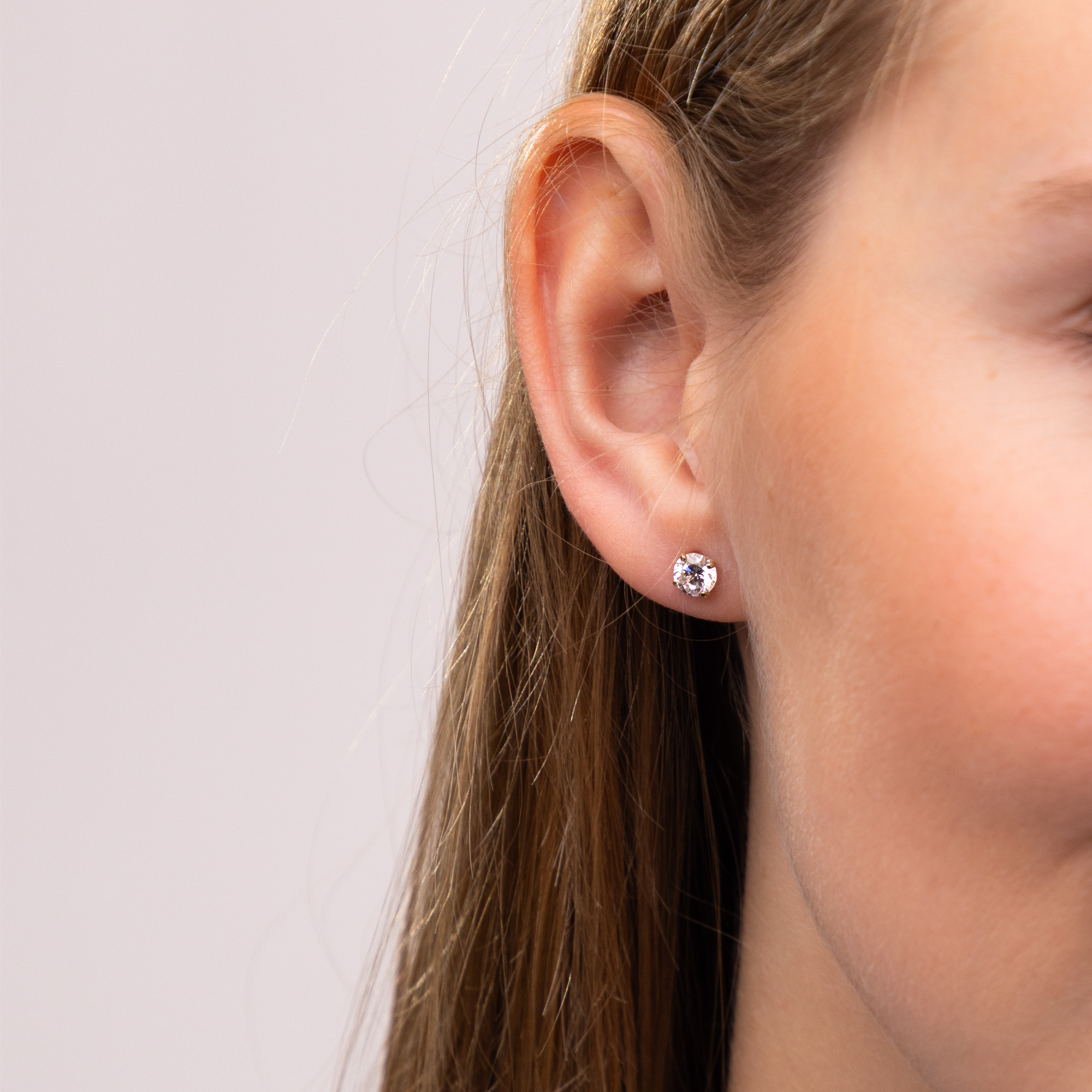 Kolczyki złote sztyfty z cyrkoniami w czterech łapkach, próba 585