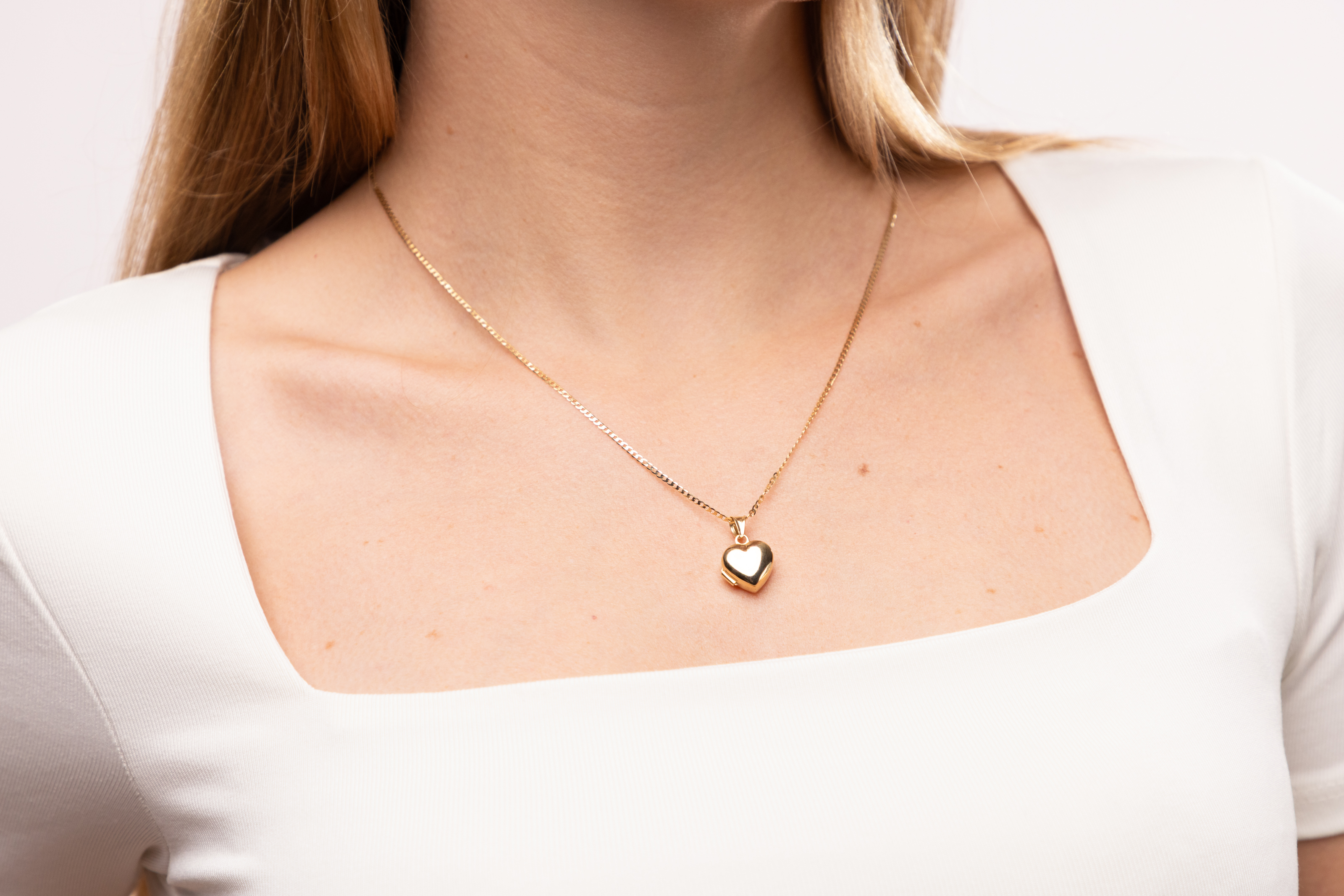 Złota zawieszka puzderko w kształcie gładkiego serca, próba 585