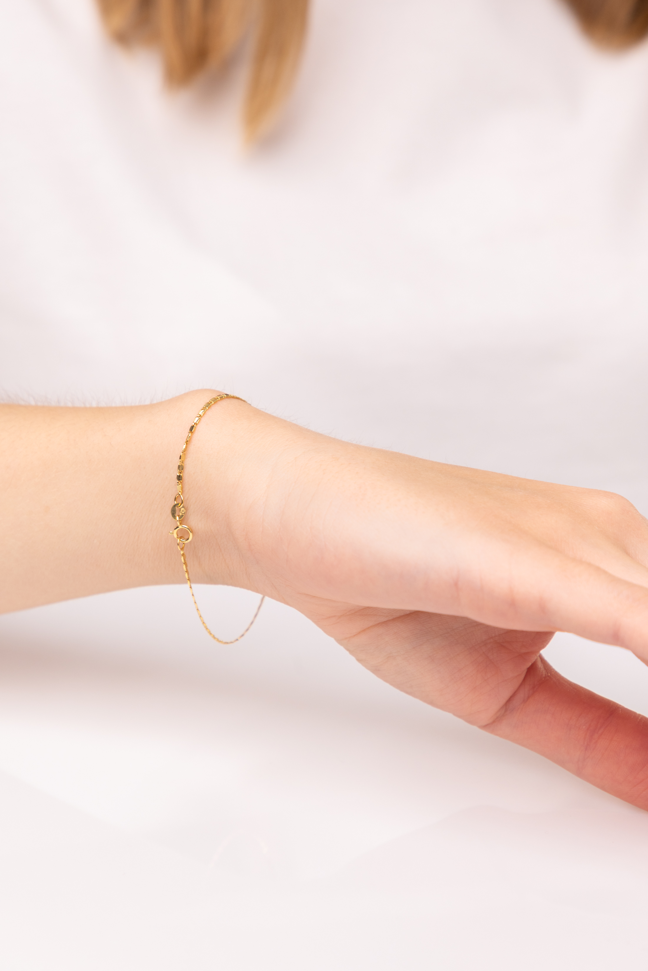 Subtelna bransoleta damska złota o fantazyjnym splocie, długość 18 cm, próba 585