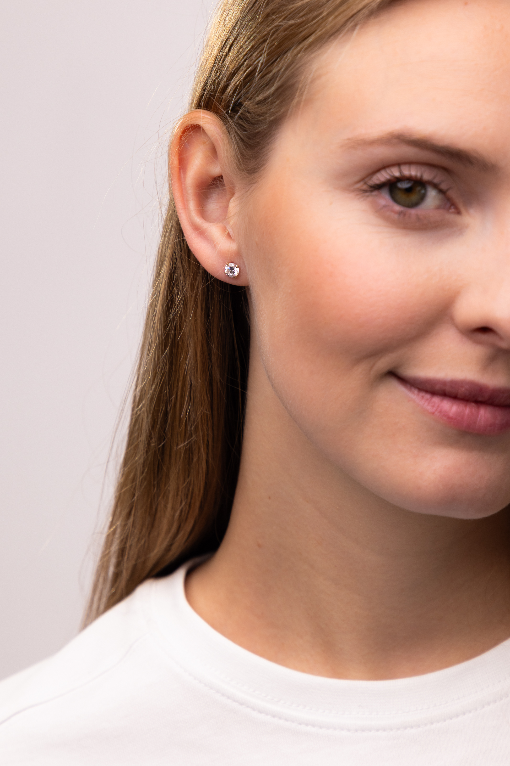 Kolczyki złote sztyfty z cyrkoniami w czterech łapkach, próba 585