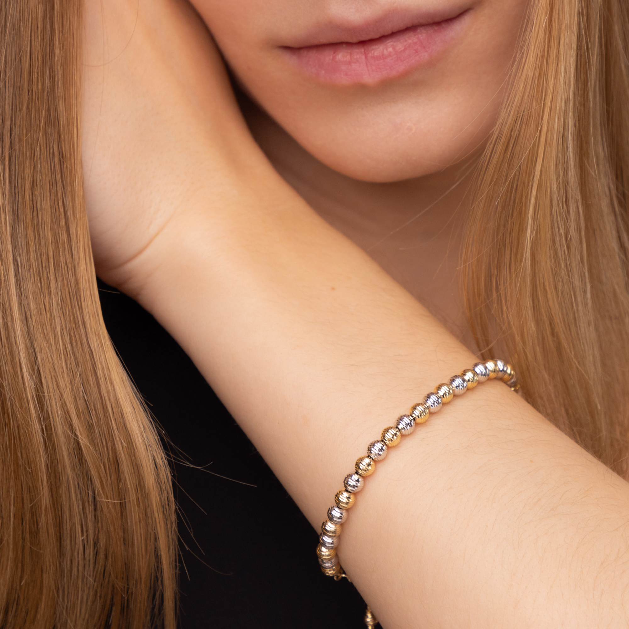 Designerska złota bransoleta z biało-żółtego złota, próba 585