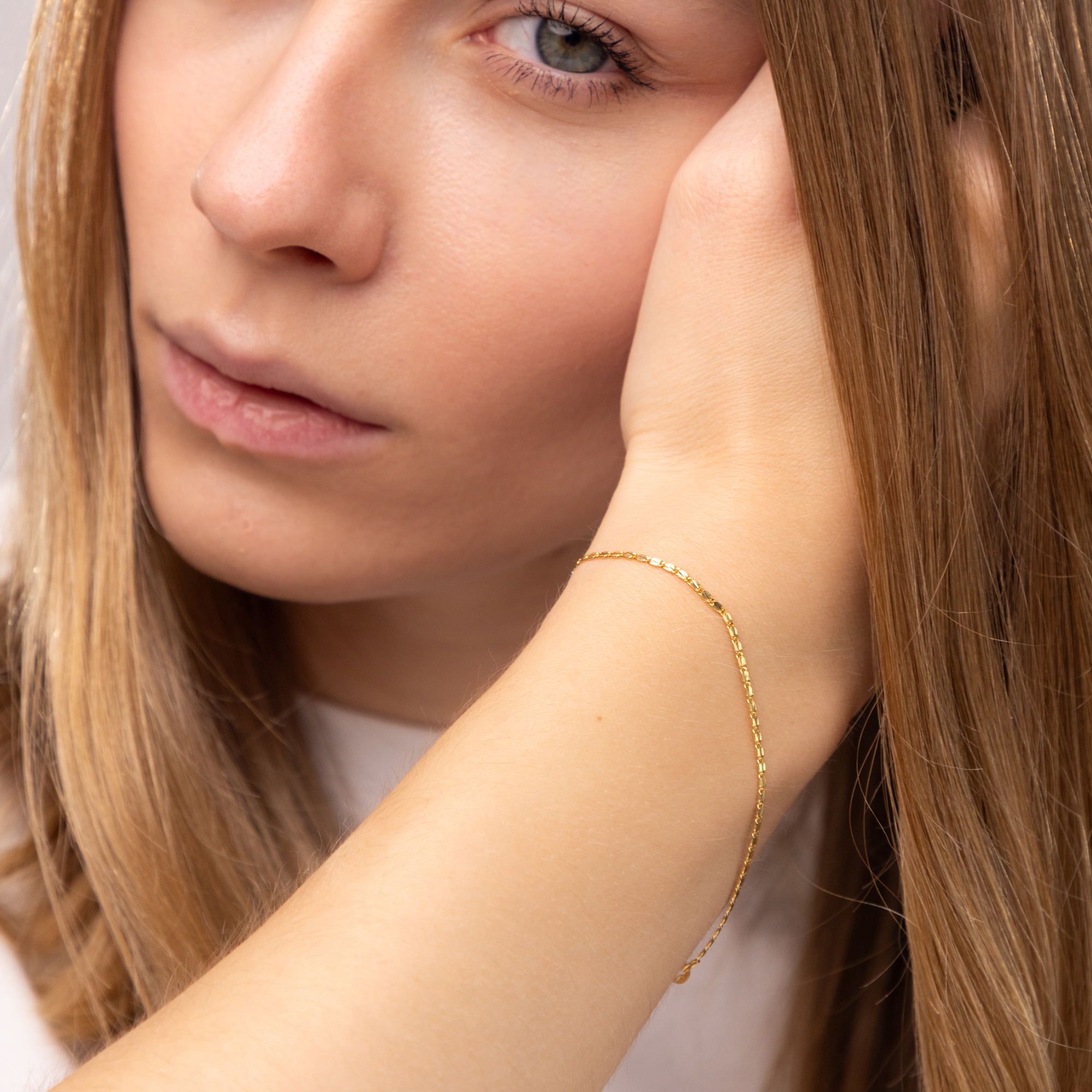 Subtelna bransoleta damska złota o fantazyjnym splocie, długość 18 cm, próba 585