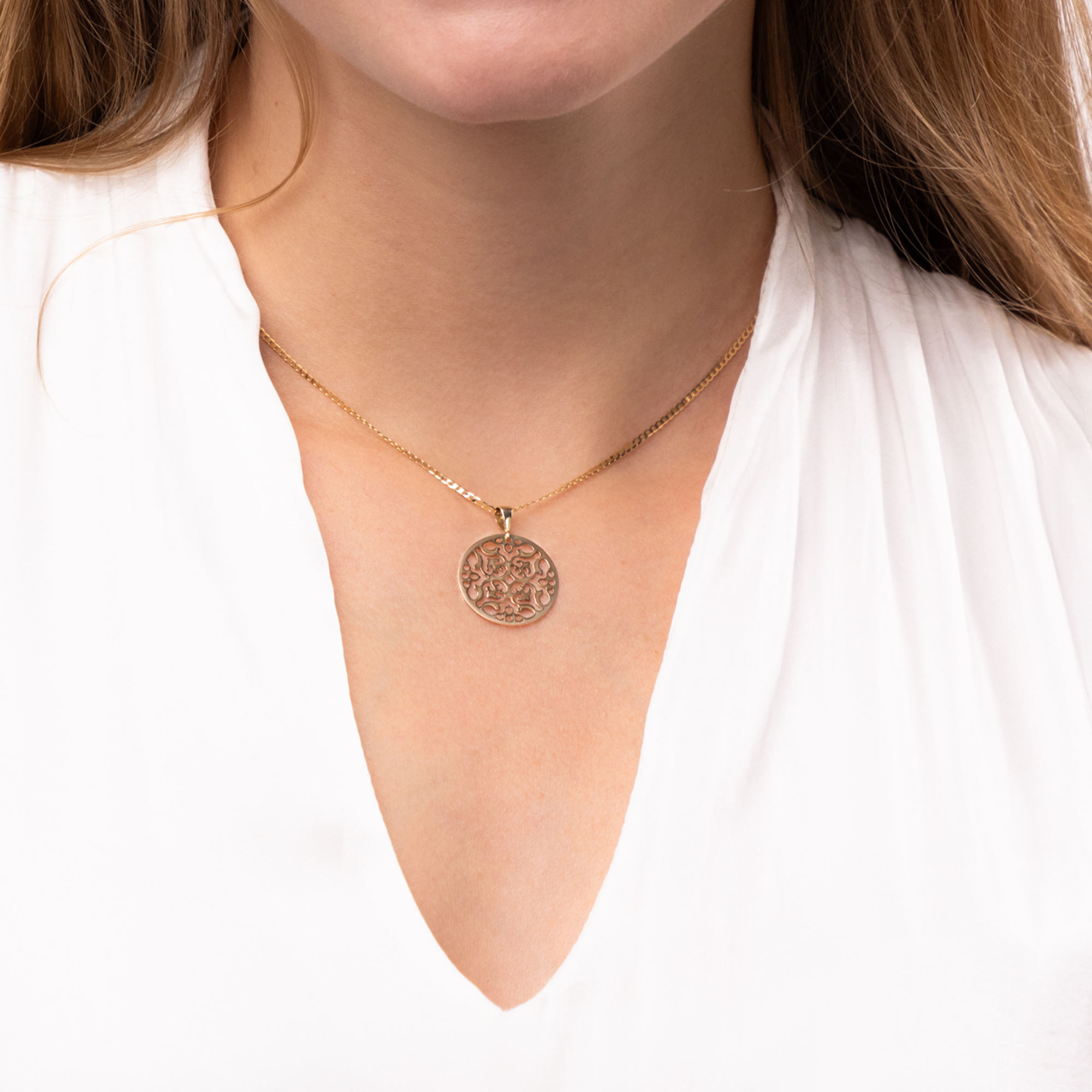 Okrągła złota zawieszka z ażurowym wzorem, próba 585