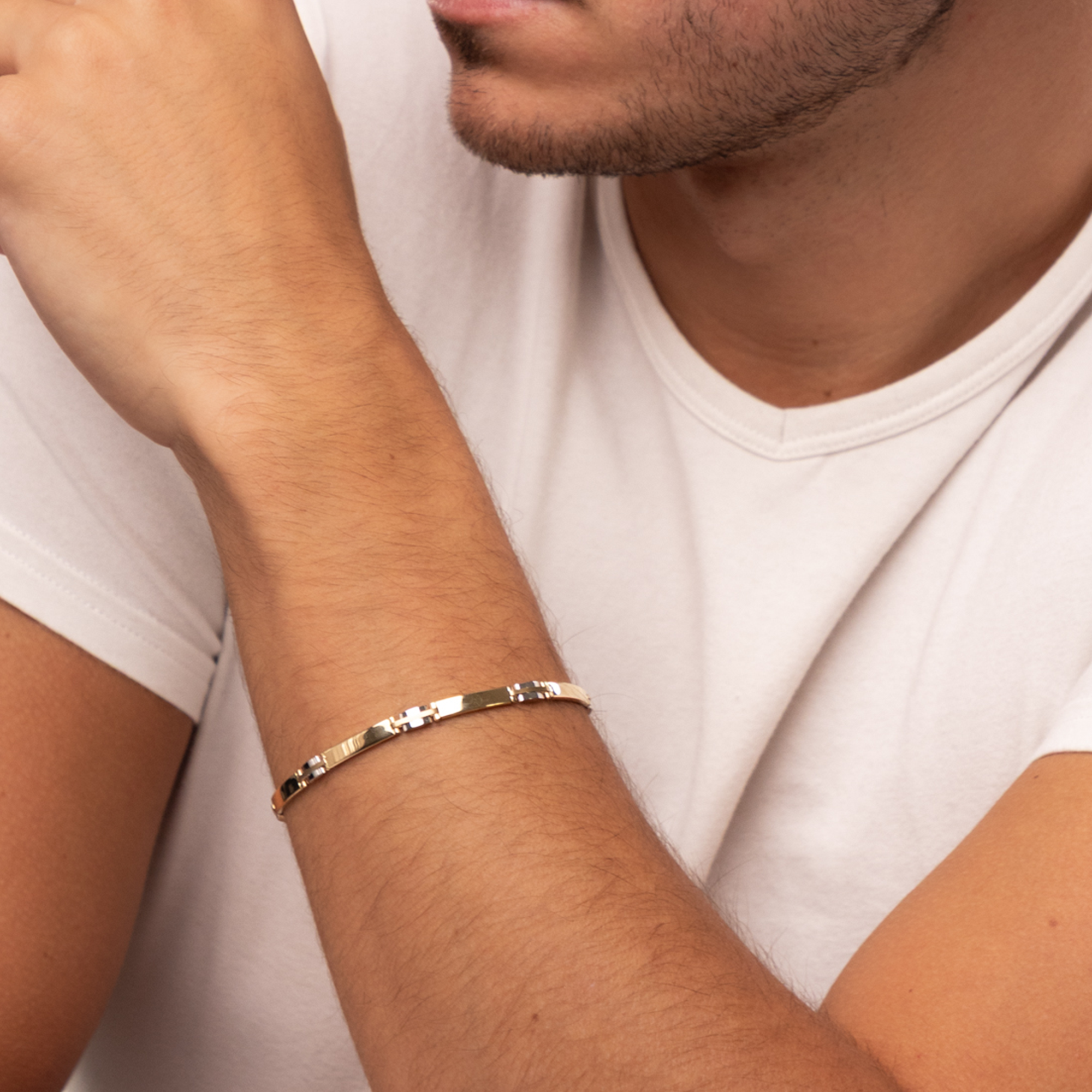 Złota męska bransoleta z rodowanymi elementami, długość 21 cm, próba 585