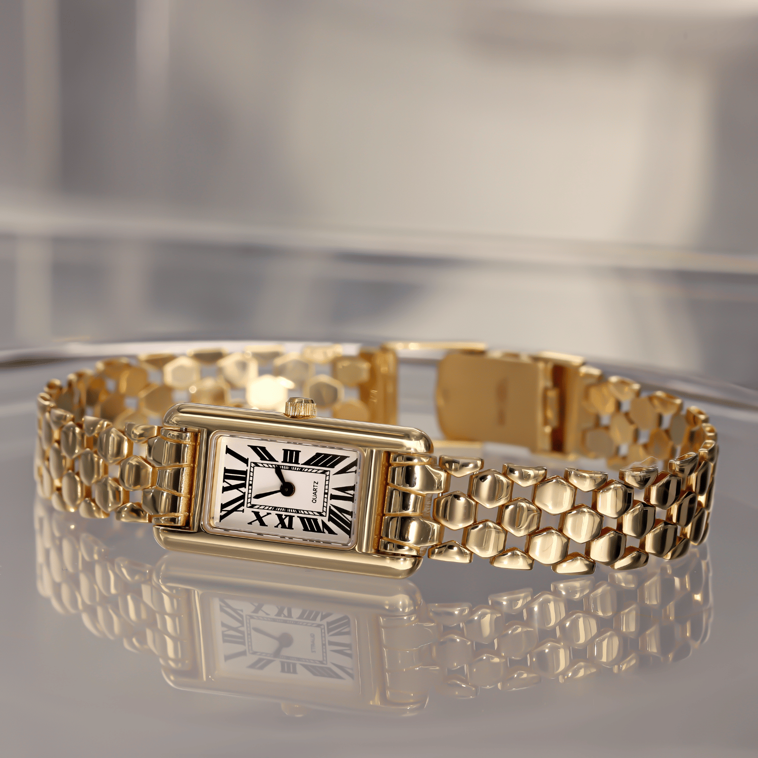 Elegancki damski zegarek złoty z prostokątną kopertą, próba 585