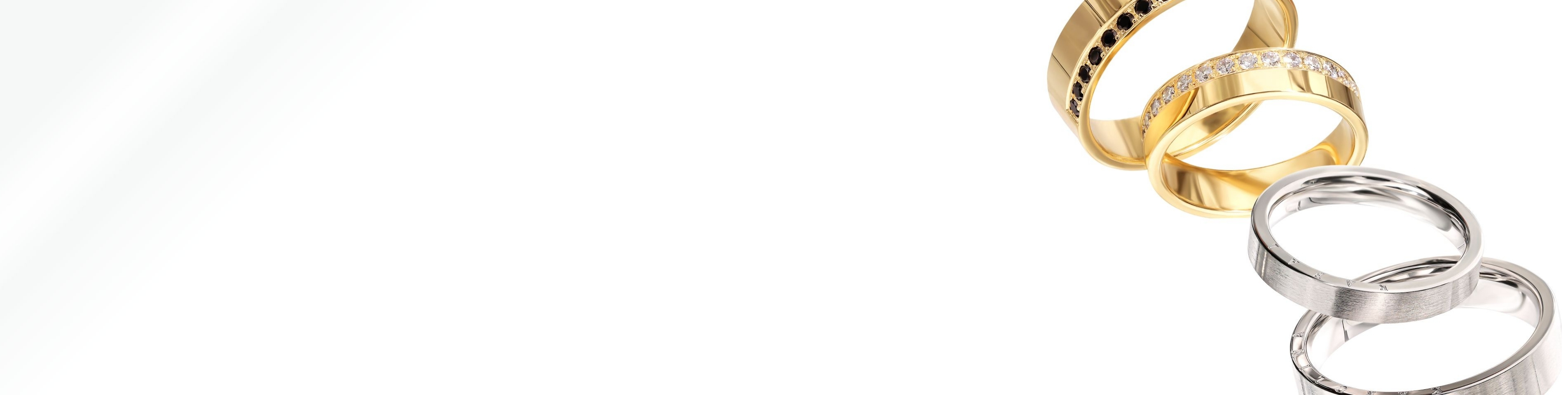 Złote obrączki ślubne Varieta 585 na białym tle